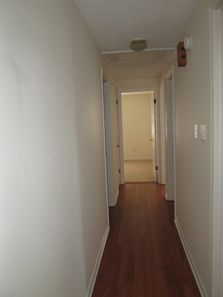 118 Village Road Shipman, VA 22971 - Photo 9 of 16 a view of a hallway with wooden floor