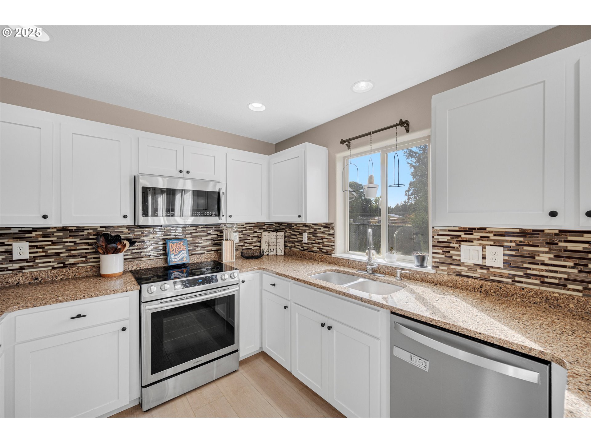 968 Salamander Road Southeast Jefferson, OR 97352 - Photo 14 of 32 a kitchen with stainless steel appliances granite countertop a stove sink and cabinets