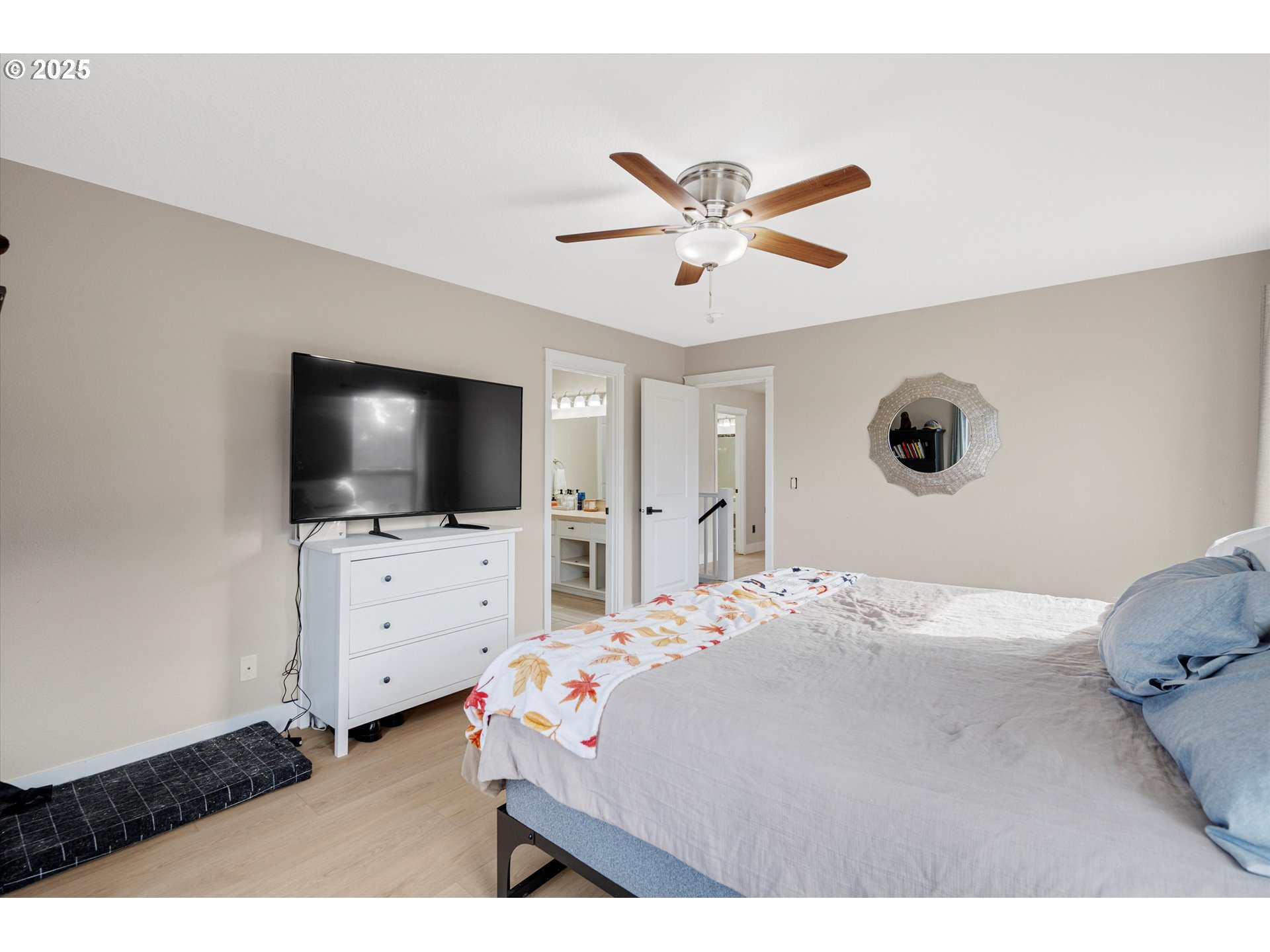 968 Salamander Road Southeast Jefferson, OR 97352 - Photo 22 of 32 a bedroom with a bed and a flat screen tv