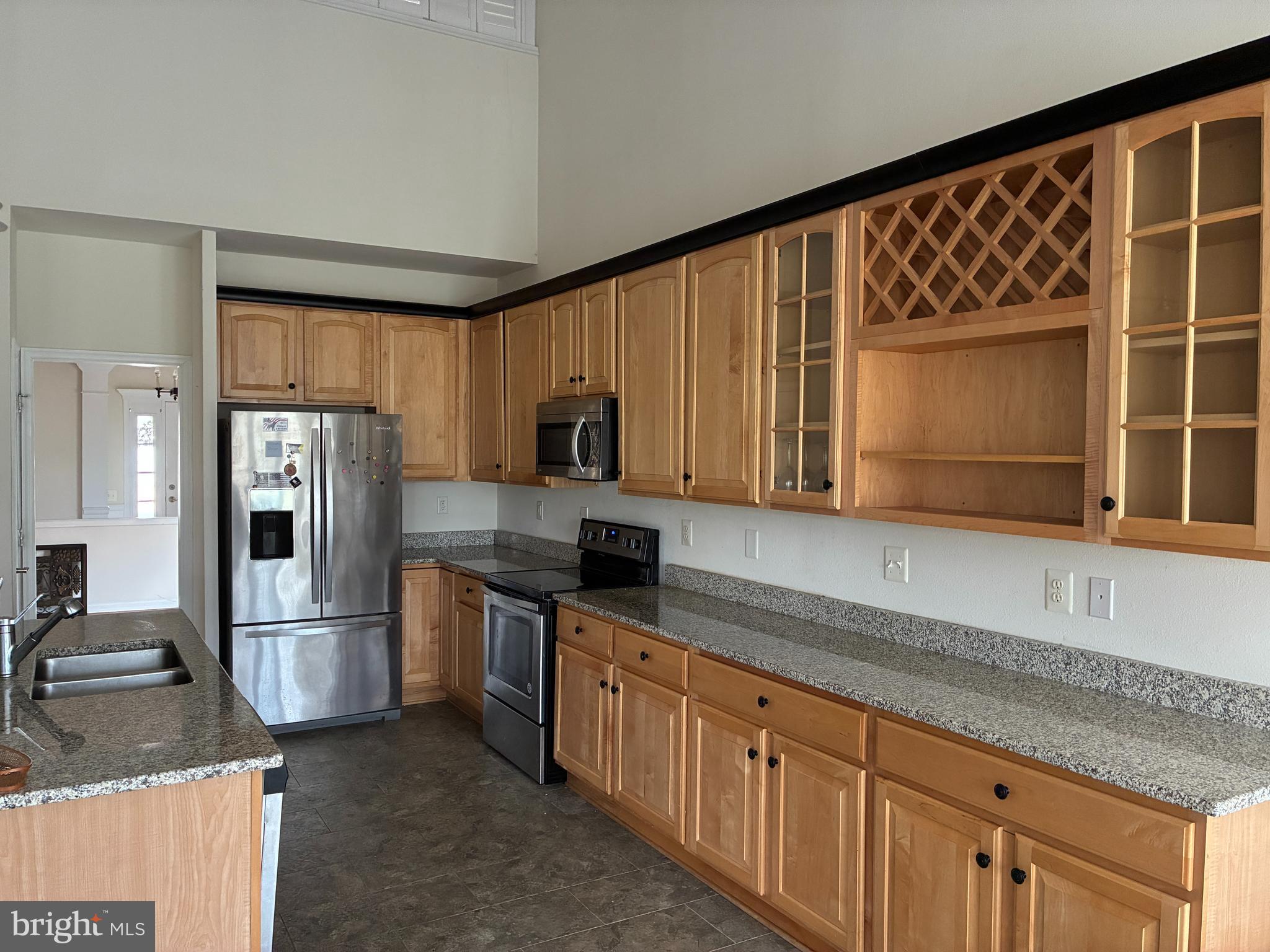 34825 Capstan Lane Lewes, DE 19958 - Photo 10 of 24 a kitchen with stainless steel appliances granite countertop a refrigerator sink and stove