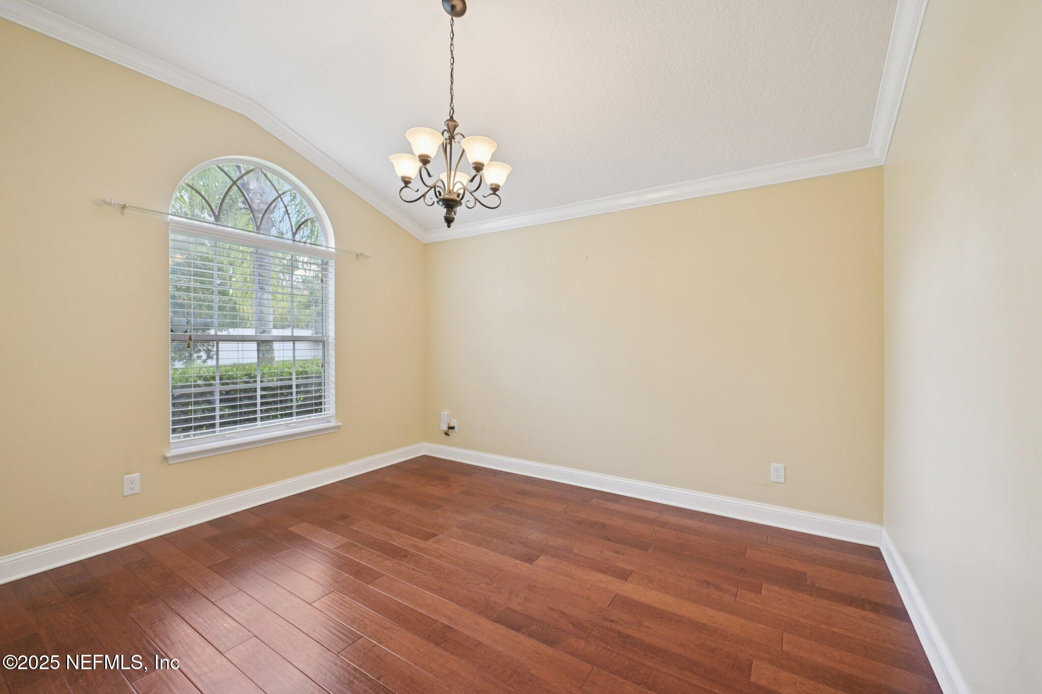 1734 Covington Lane Fleming Island, FL 32003 - Photo 11 of 54 a view of an empty room with a window