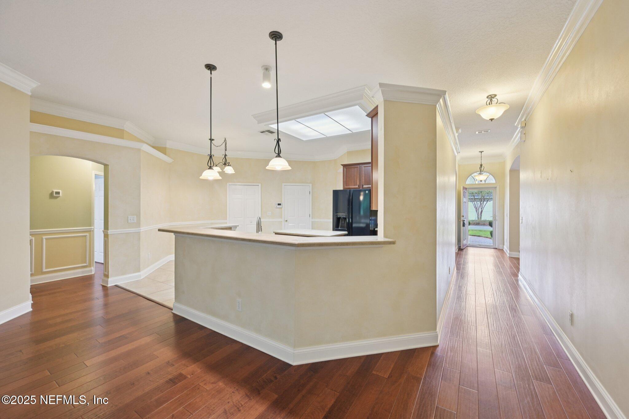 1734 Covington Lane Fleming Island, FL 32003 - Photo 17 of 54 a view of a kitchen with a wooden floor
