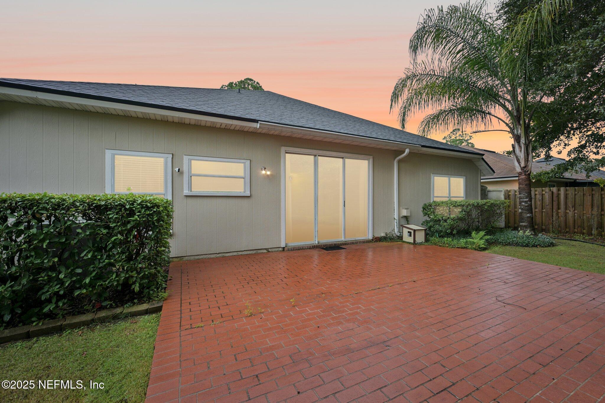 1734 Covington Lane Fleming Island, FL 32003 - Photo 3 of 54 a view of a house with a garden