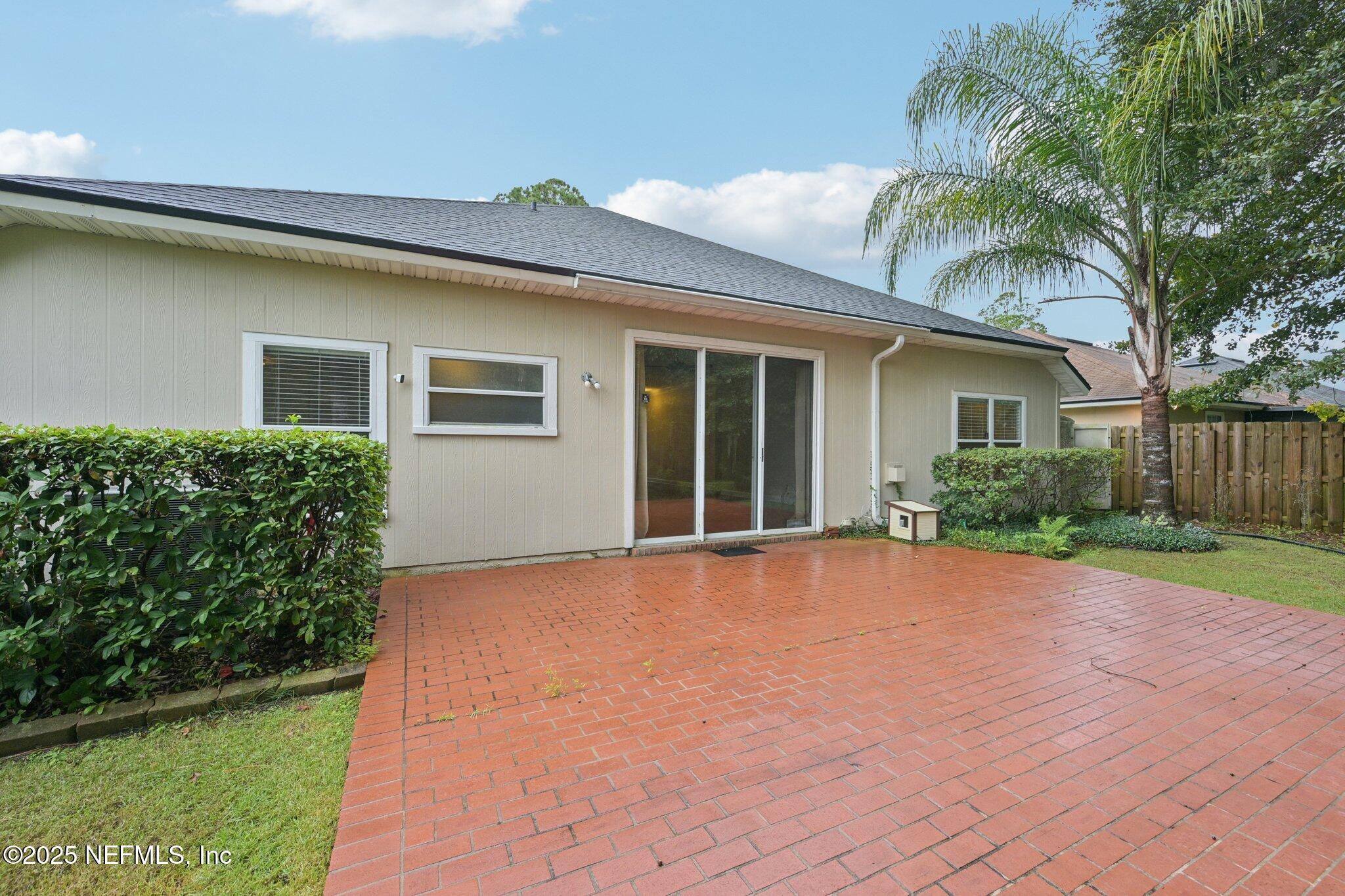 1734 Covington Lane Fleming Island, FL 32003 - Photo 39 of 54 a view of an house with backyard and garden
