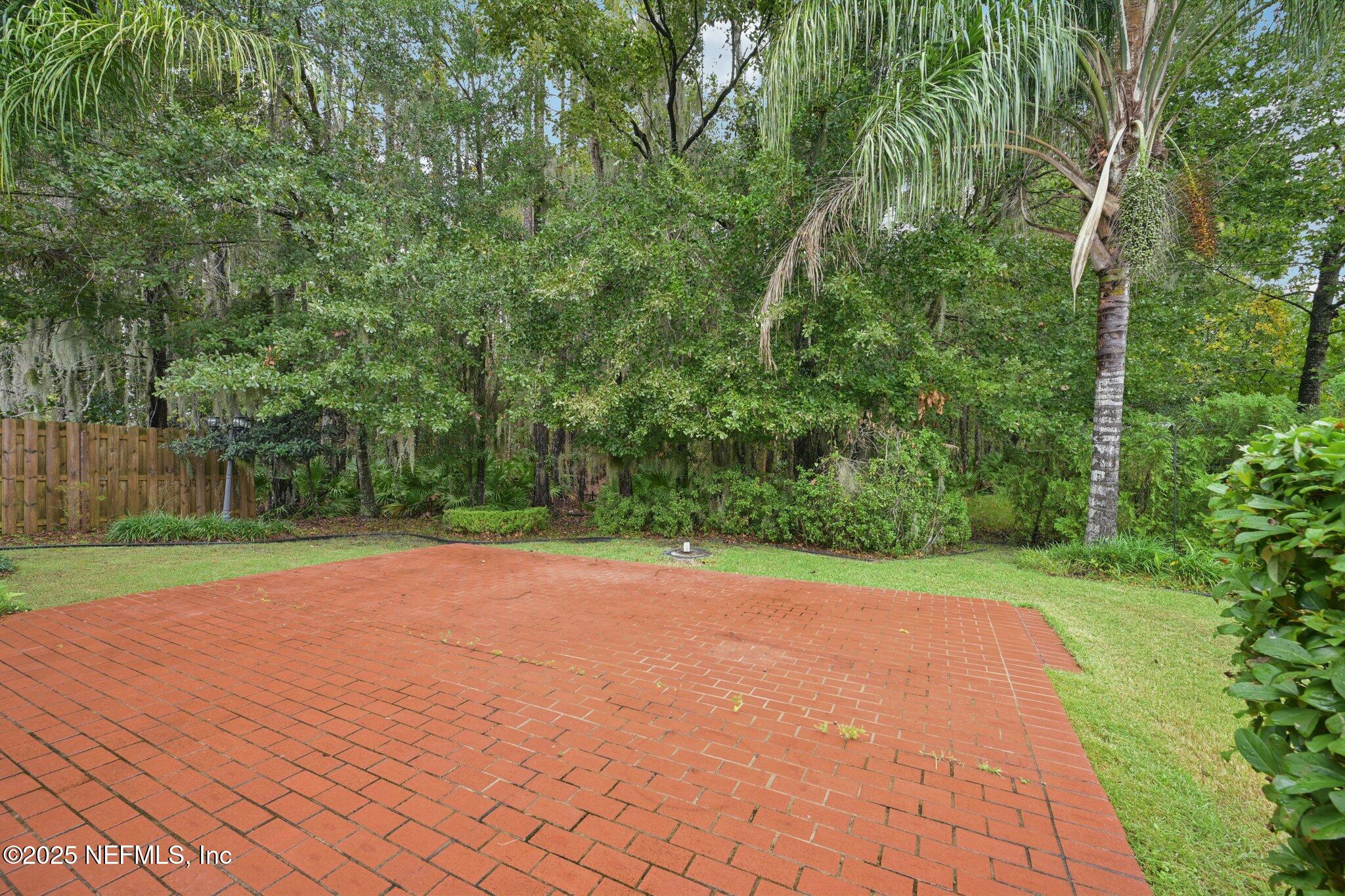 1734 Covington Lane Fleming Island, FL 32003 - Photo 42 of 54 a view of a yard with an outdoor space