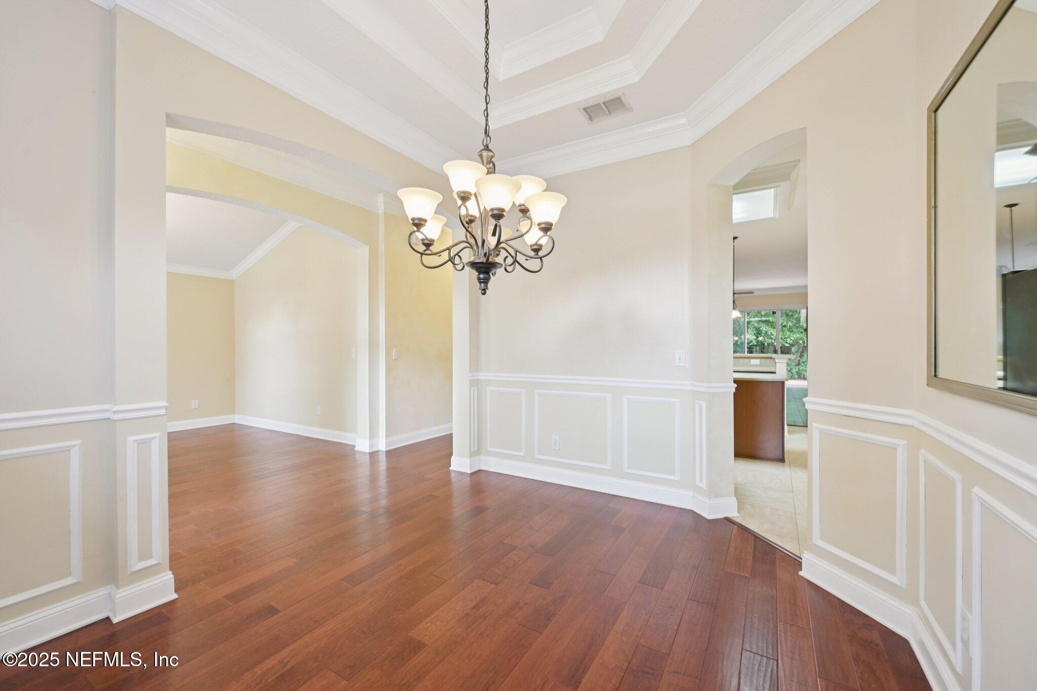 1734 Covington Lane Fleming Island, FL 32003 - Photo 10 of 54 a view of a chandelier in a room