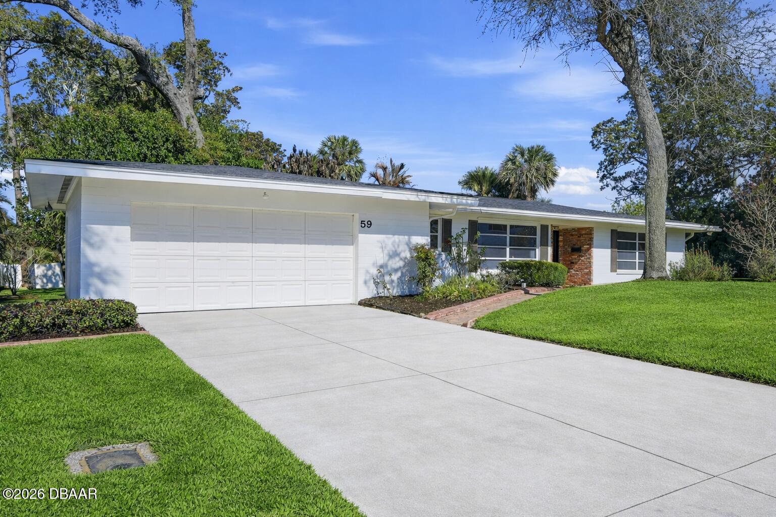 59 Amsden Road Ormond Beach, FL 32176 - Photo 4 of 73 6 Front of home, angle from left