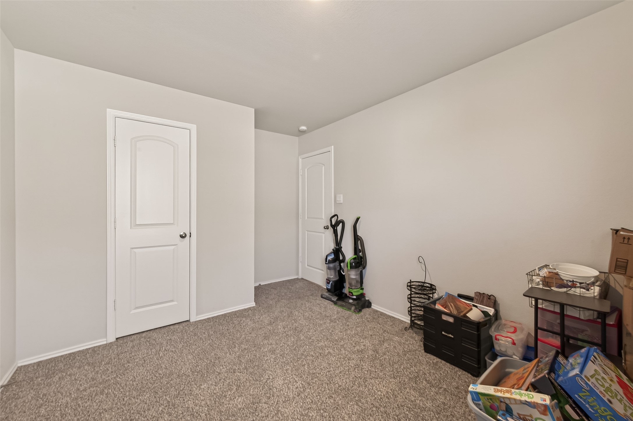 2407 Hartsel Frst Trail Spring, TX 77373 - Photo 18 of 26 a view of a room with gym equipment