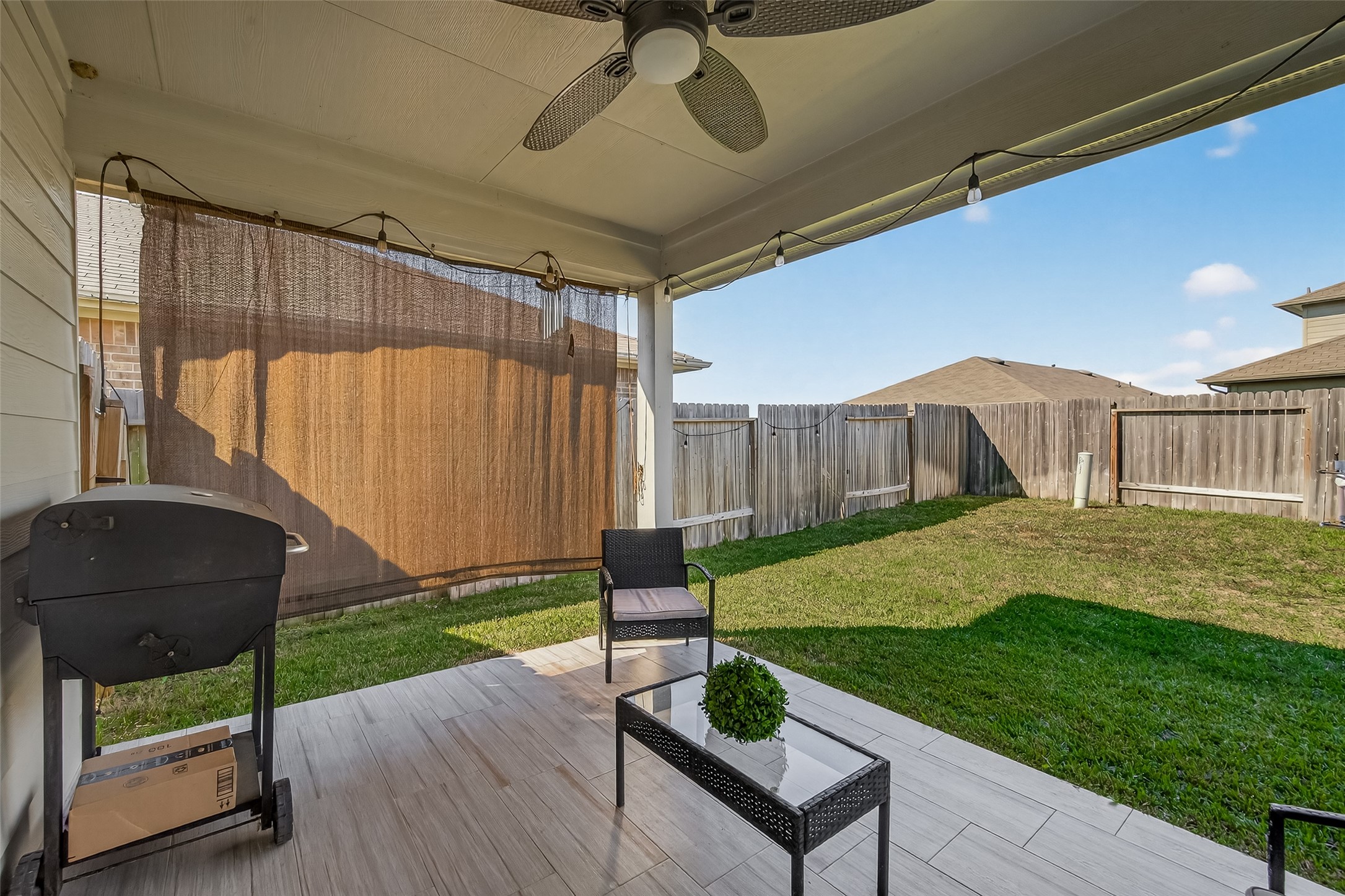 2407 Hartsel Frst Trail Spring, TX 77373 - Photo 22 of 26 a view of a chair and table in the patio