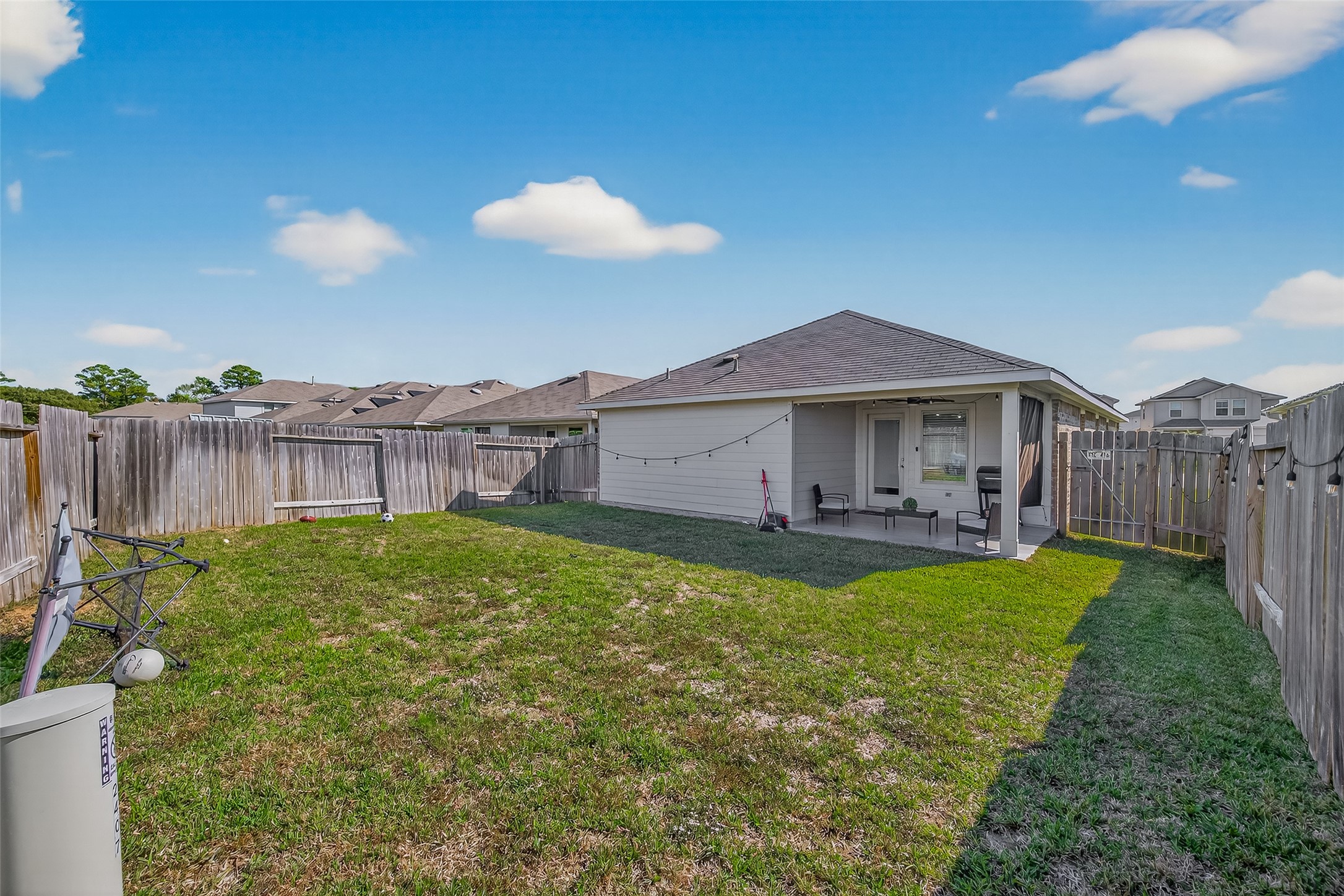 2407 Hartsel Frst Trail Spring, TX 77373 - Photo 25 of 26 a view of a house with backyard and sitting area