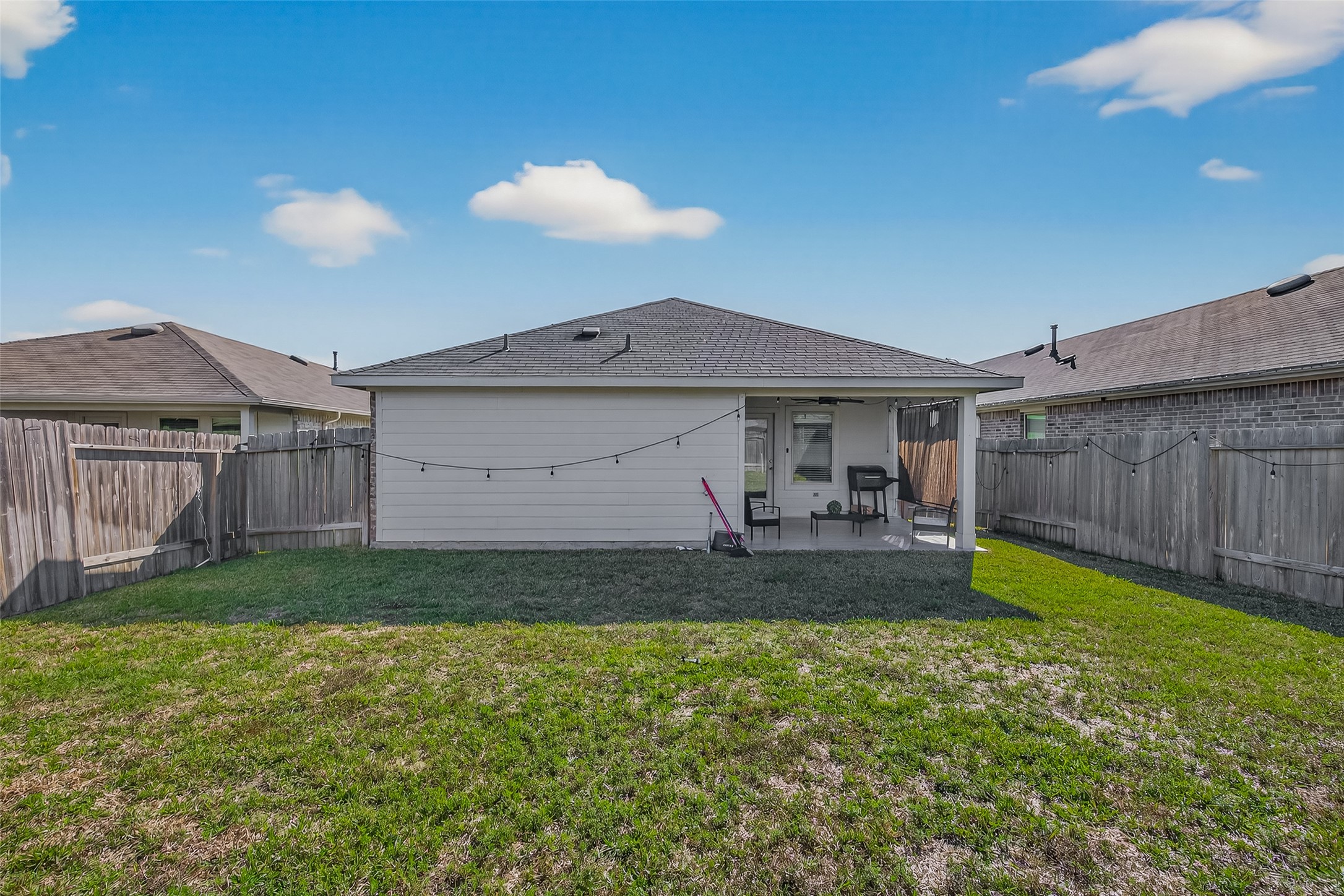 2407 Hartsel Frst Trail Spring, TX 77373 - Photo 26 of 26 a view of a backyard with a garden and entertaining space