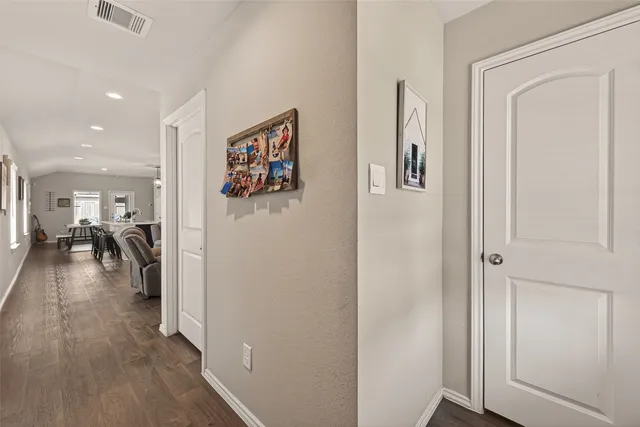 a view of livingroom with hardwood floor and a ceiling fan
