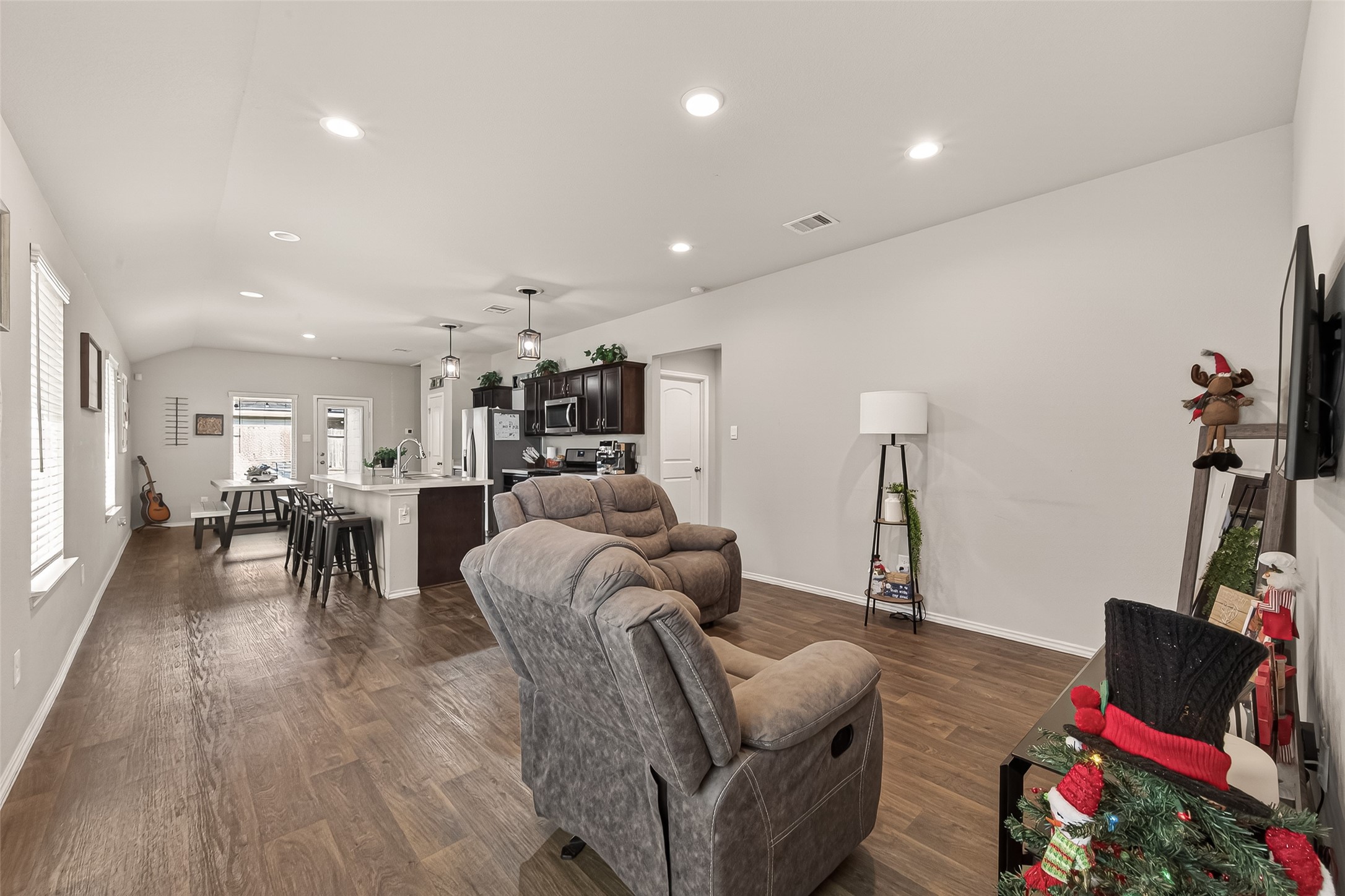2407 Hartsel Frst Trail Spring, TX 77373 - Photo 4 of 26 a living room with furniture and a wooden floor