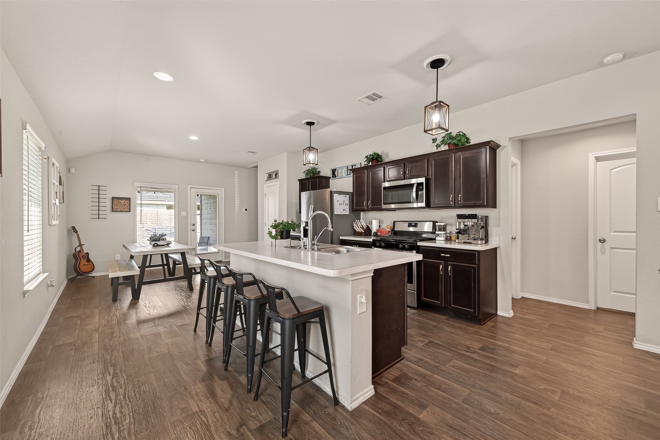 2407 Hartsel Frst Trail Spring, TX 77373 - Photo 8 of 26 a large kitchen with a table and chairs