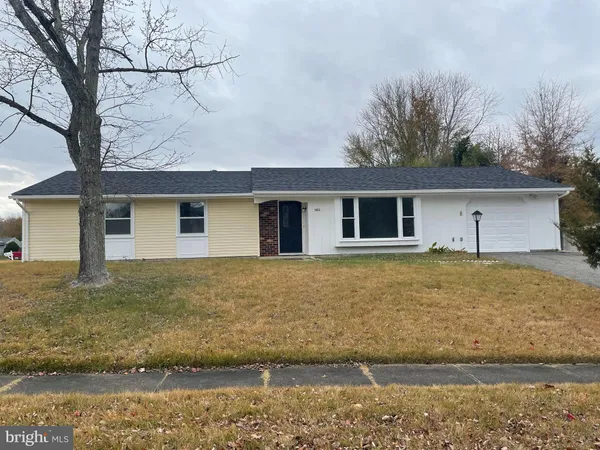 a front view of house with yard