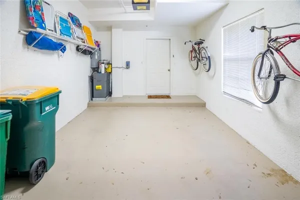 a view of a storage & utility room with a sink