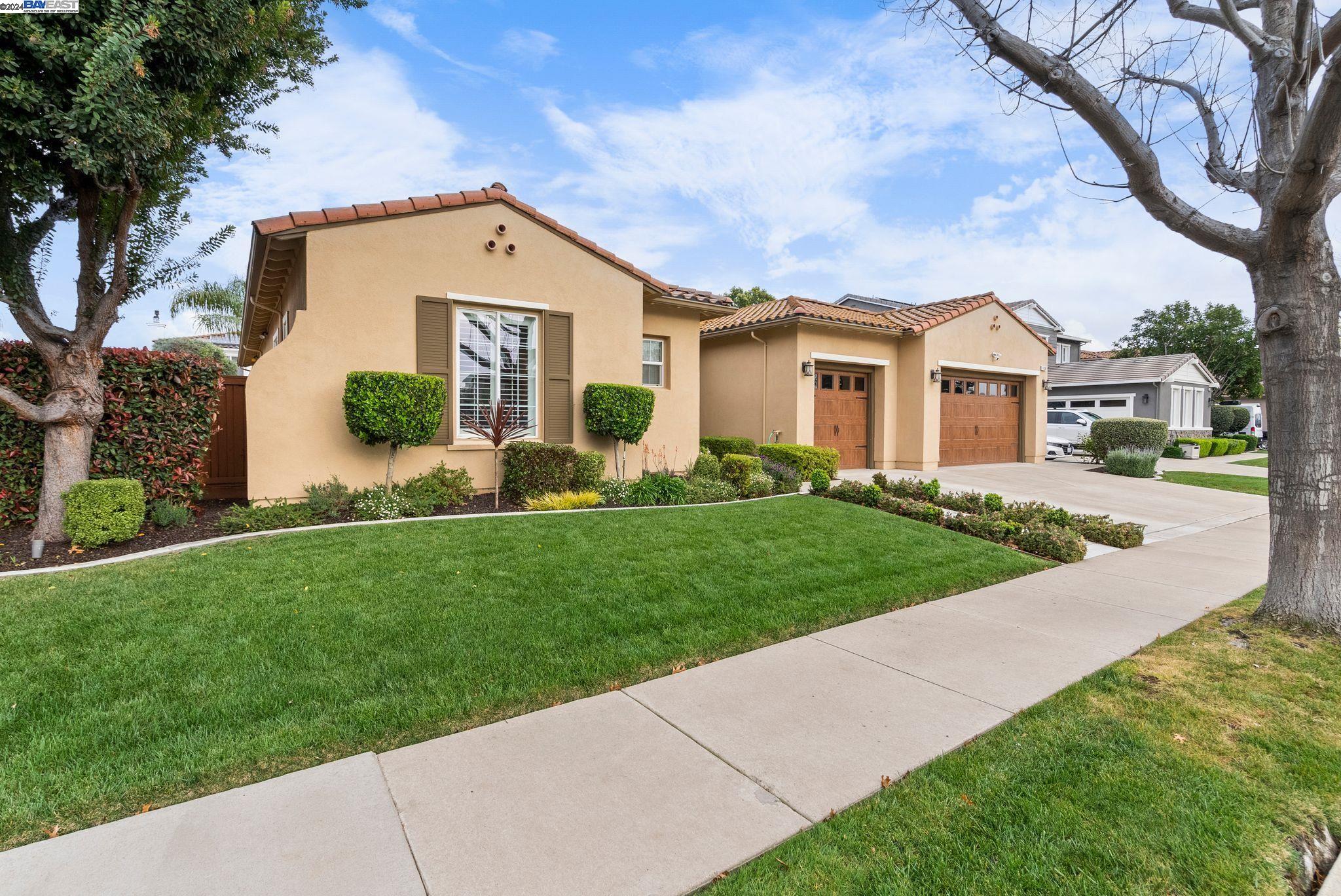 1634 Strathaven Place Brentwood, CA 94513 - Photo 1 of 1 front view of a house with a yard