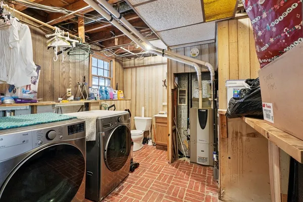 a utility room with dryer and washer