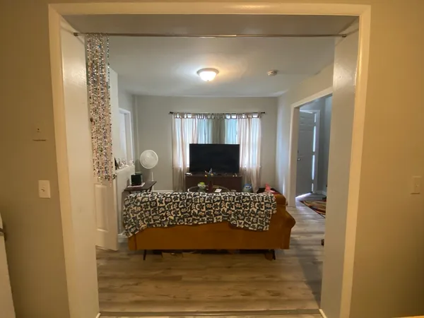 a living room with a couch and a fireplace