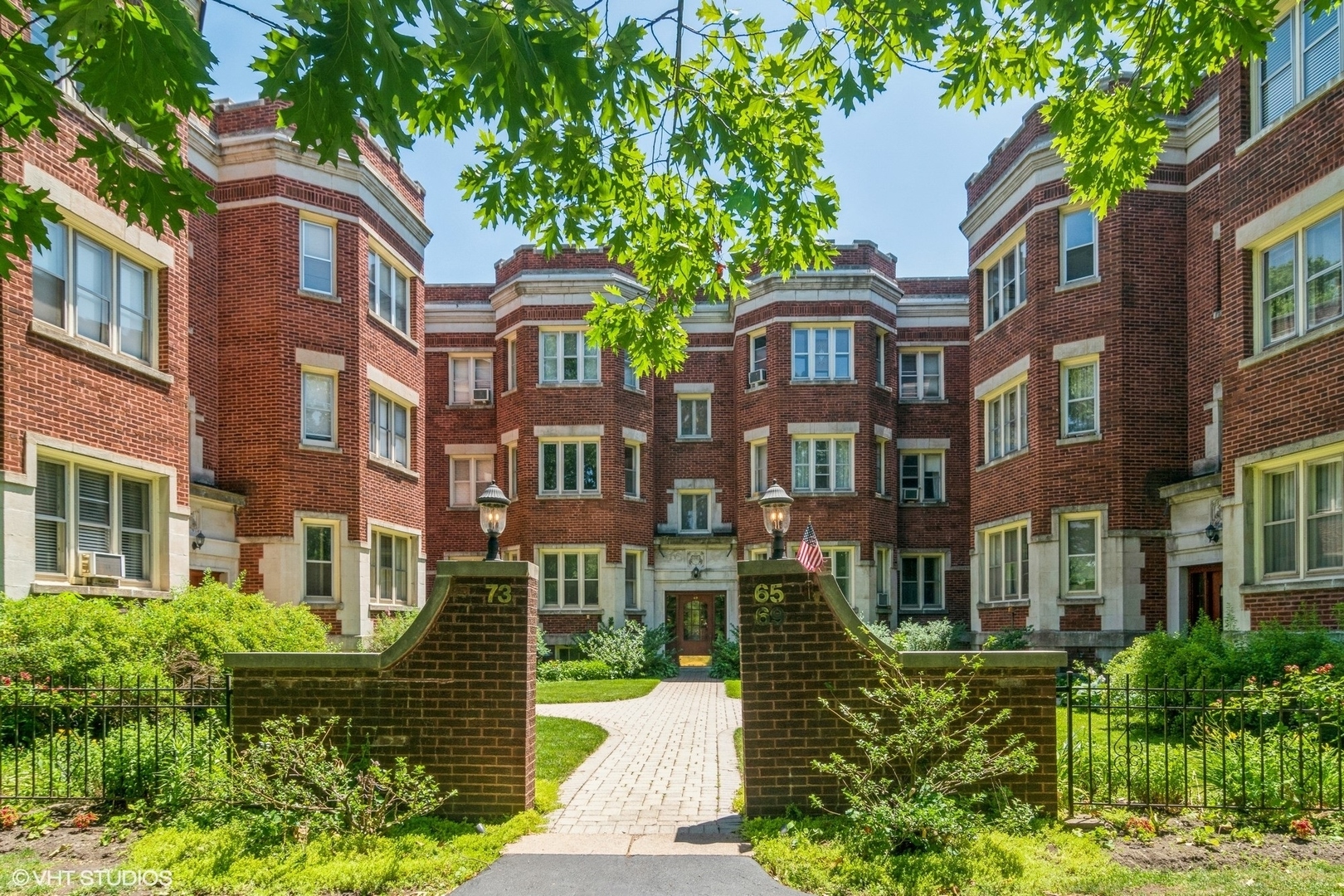 a front view of a multi story residential apartment buildings