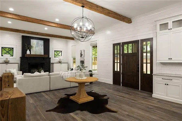 a kitchen with stainless steel appliances granite countertop a sink and cabinets
