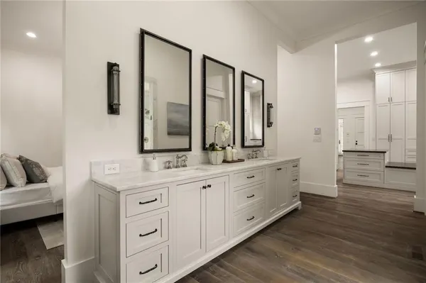 a bathroom with a sink and mirror