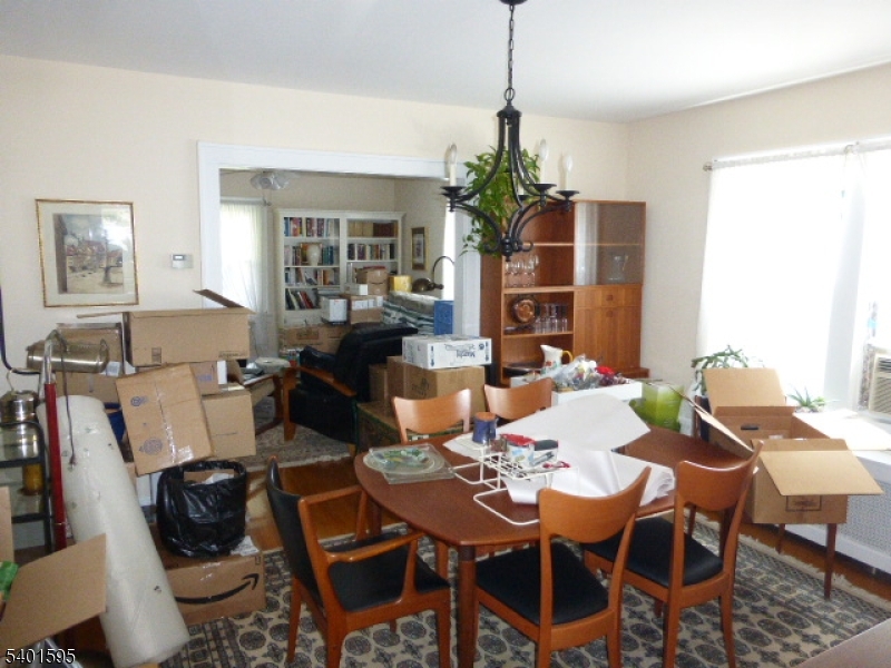 18 Sherman Avenue, Unit B Morris Plains, NJ 07950 - Photo 6 of 24 a view of a dining room with furniture window and outside view
