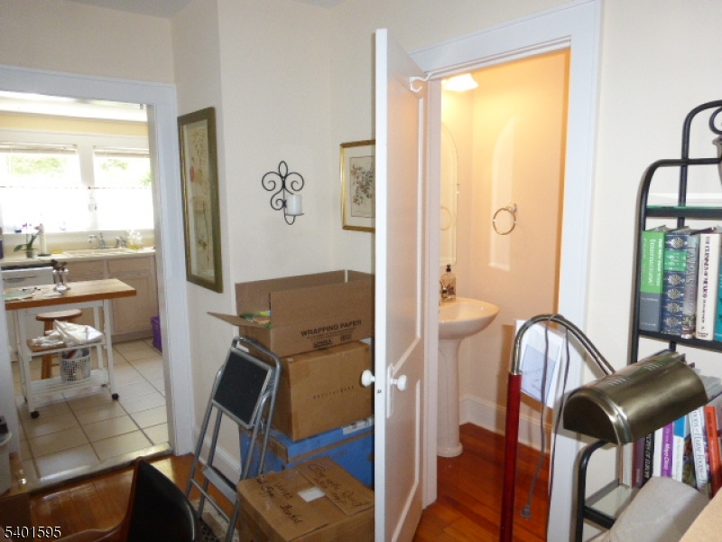 18 Sherman Avenue, Unit B Morris Plains, NJ 07950 - Photo 7 of 24 a view of a balcony with chair and table