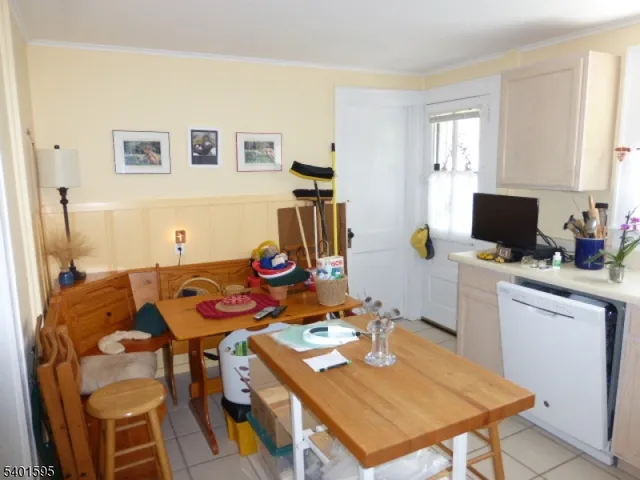 a view of a workspace with furniture