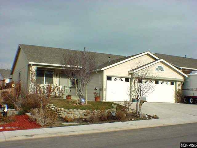 8131 Monterey Reno, NV 89506 - Photo 8 of 8 a front view of a house with garden