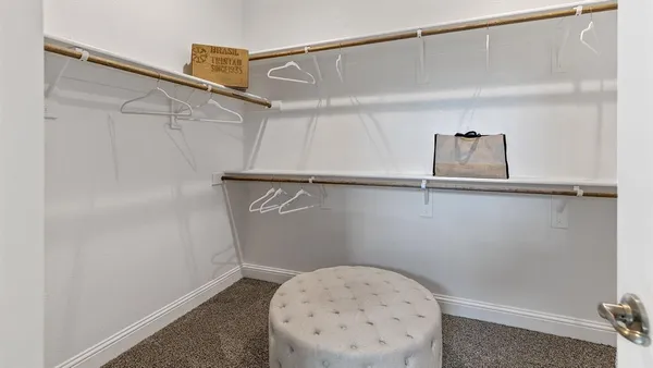 a bathroom with double vanity sink and mirror