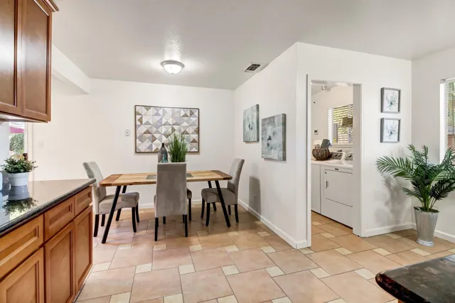 a view of a dining room with furniture