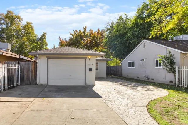 a view of a house with a garage