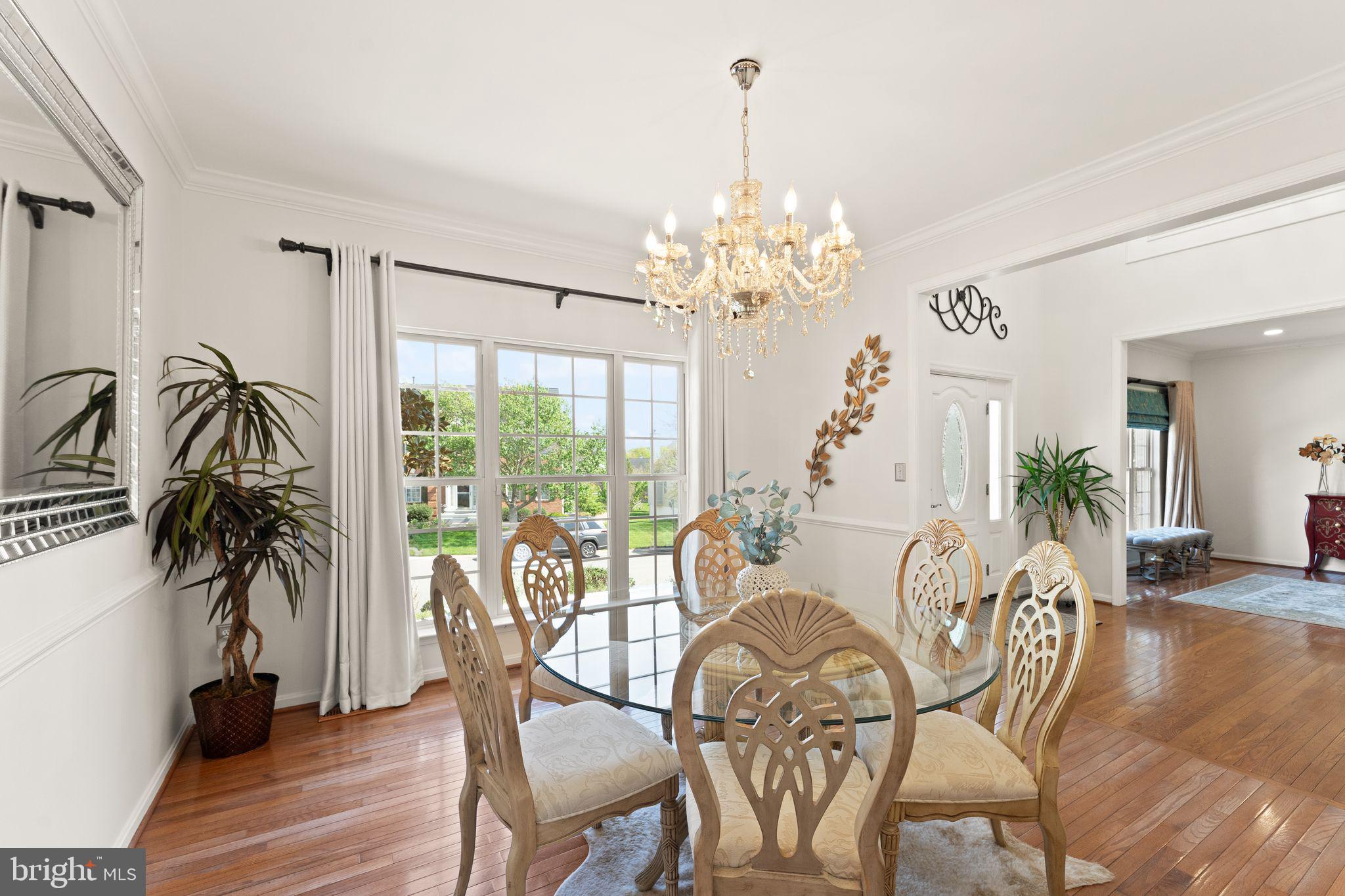 43179 Parkers Ridge Drive Leesburg, VA 20176 - Photo 18 of 108 a view of a dining room with furniture window and wooden floor