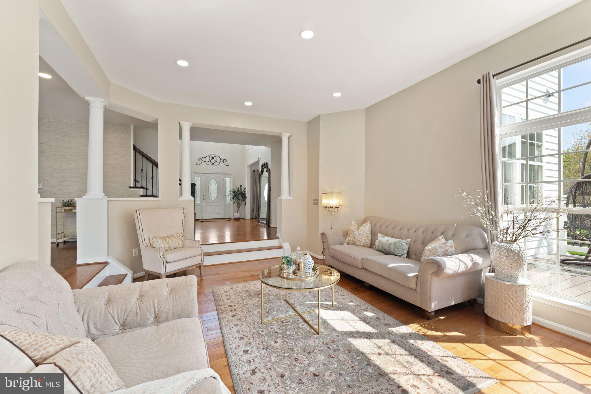 43179 Parkers Ridge Drive Leesburg, VA 20176 - Photo 26 of 108 a living room with furniture and a large window
