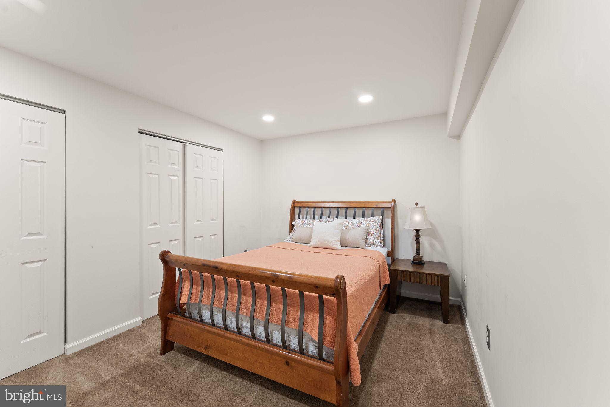 43179 Parkers Ridge Drive Leesburg, VA 20176 - Photo 78 of 108 a bedroom with a bed and a window