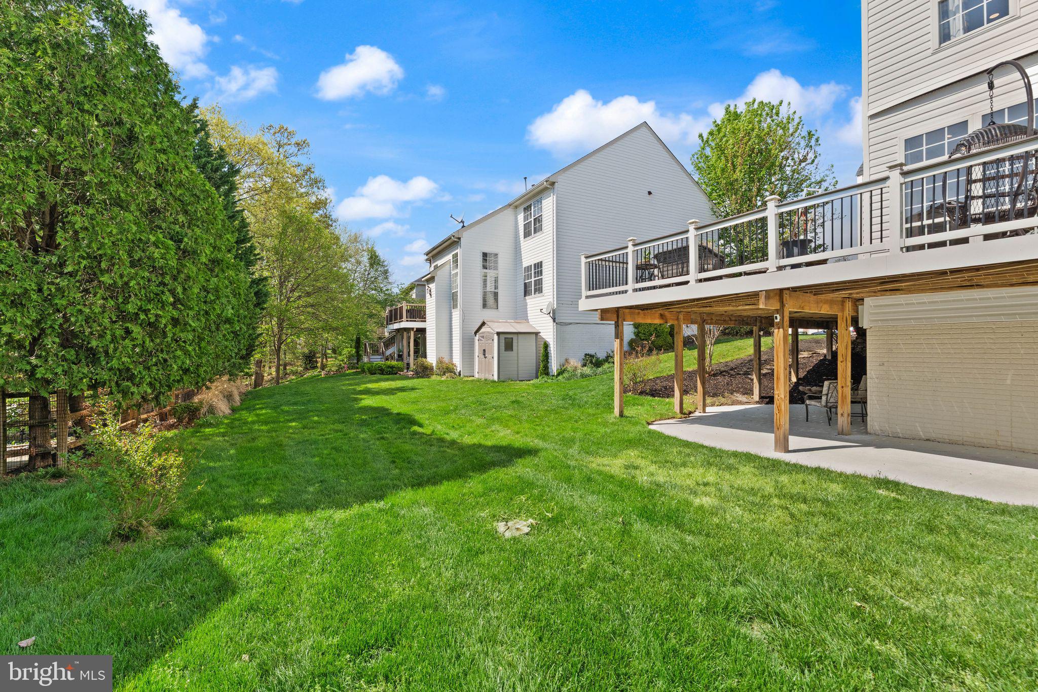 43179 Parkers Ridge Drive Leesburg, VA 20176 - Photo 90 of 108 a view of house with a big yard and large trees