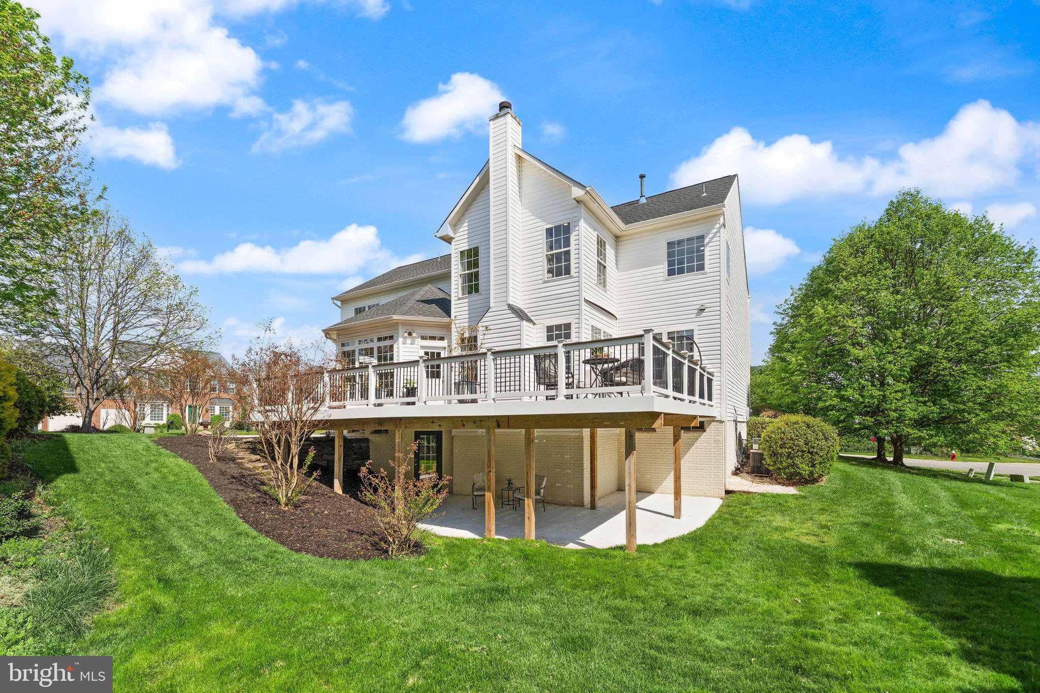 43179 Parkers Ridge Drive Leesburg, VA 20176 - Photo 92 of 108 a view of a house with a big yard and sitting area