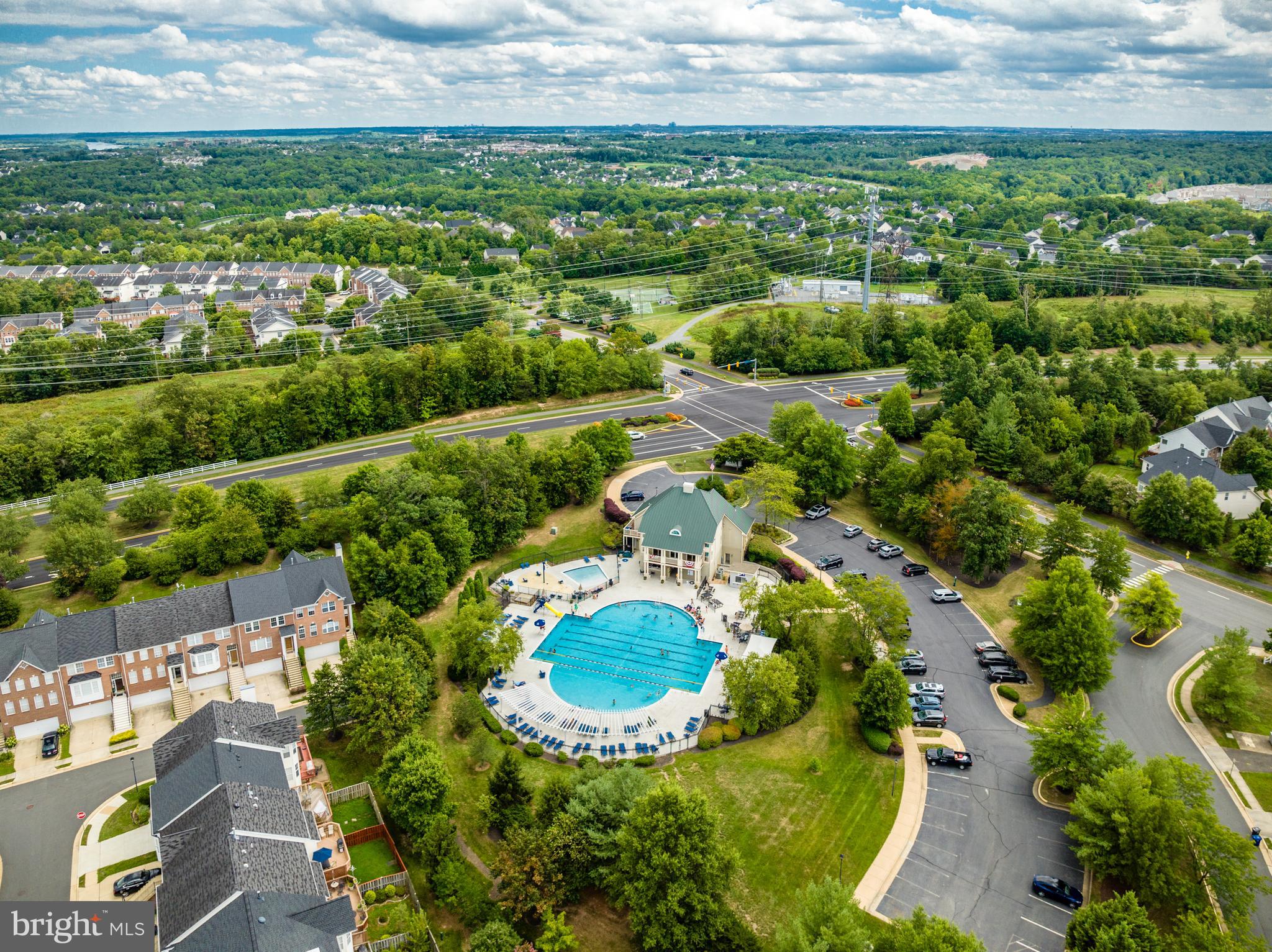 43179 Parkers Ridge Drive Leesburg, VA 20176 - Photo 100 of 108 an aerial view of residential houses with outdoor space and trees