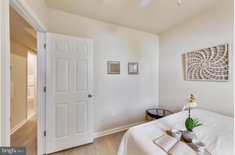 1720 H Street Northeast, Unit A Washington, DC 20002 - Photo 9 of 31 Serene bedroom with modern accents.