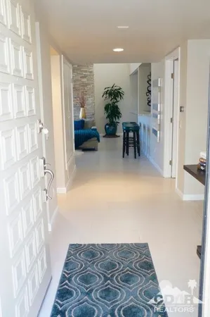 a view of livingroom with furniture and window