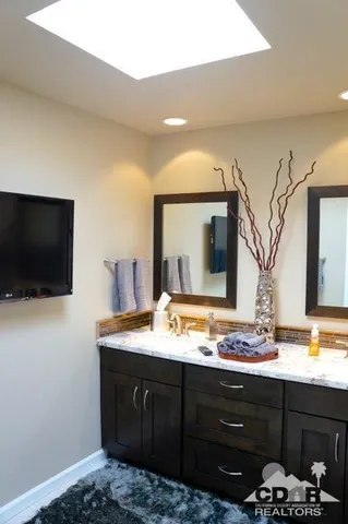 a outdoor living space with furniture and a potted plant