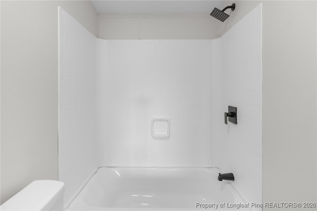 1750 John Russell Road Raeford, NC 28376 - Photo 29 of 39 a bathroom with a shower