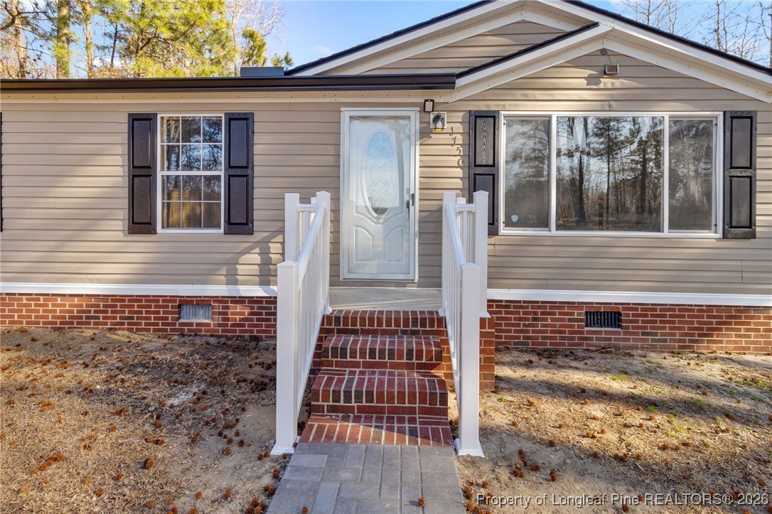 1750 John Russell Road Raeford, NC 28376 - Photo 4 of 39 front view of a house