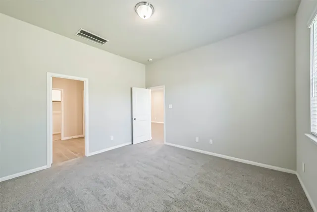 an empty room with an entryway