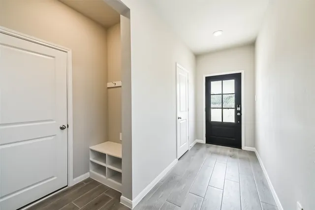 a view of livingroom with an empty space and window