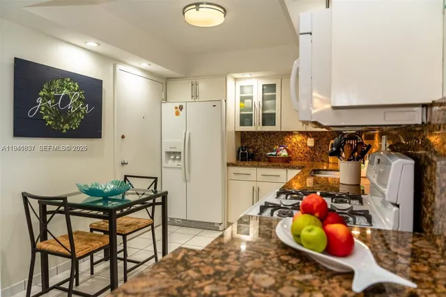 a bedroom with a bed and a desk