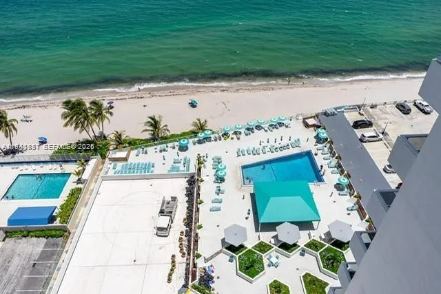 a front view of a building with garden