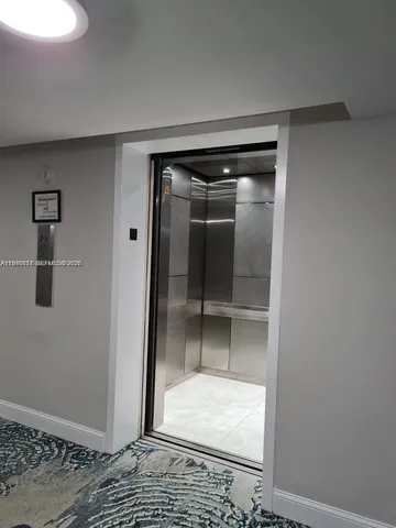 a room with lots of wooden furniture