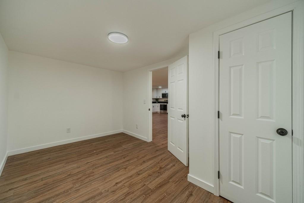 3617 Bob White Lane Southwest Loganville, GA 30052 - Photo 26 of 48 wooden floor in an empty room